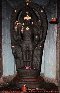 Bhiarava with his vahana, the dog, in the Nageshvara temple in Kumbakonam 